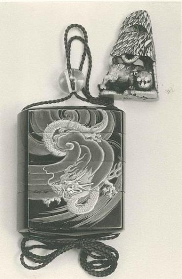 Inro:  (front) Descending Dragon among Waves and Clouds; (back) Ascending Dragon among Waves and Clouds