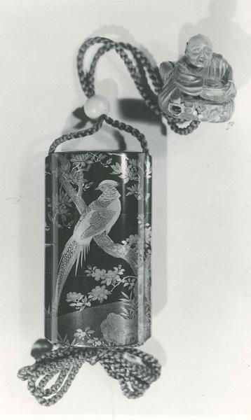 Inro:  (front) Male Pheasant on Limb of Flowering Magnolia near Rock and Camellia; (back) Hen Pheasant on Rock with Orchids and Bamboo Grasses