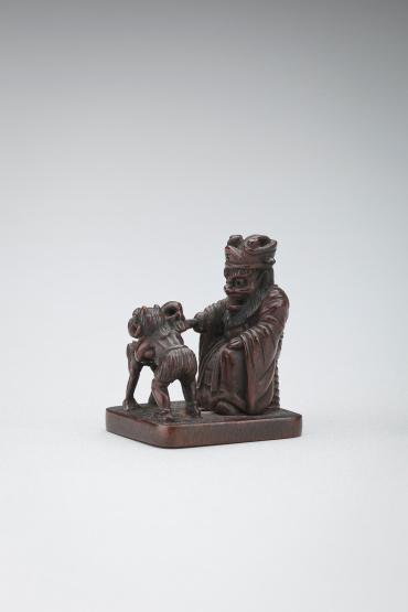 Netsuke: Shoki and two wrestling dragons