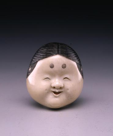 Netsuke: Mask of Okame