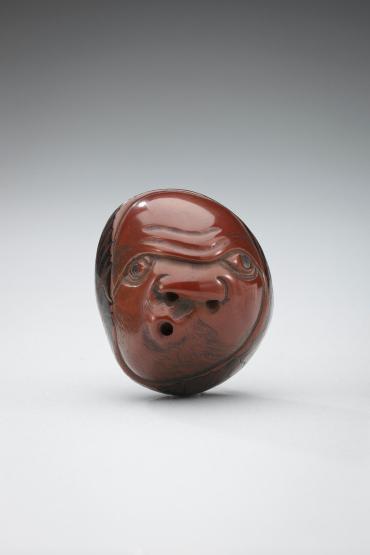 Netsuke: comic head of Hyotoko