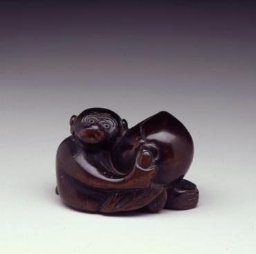 Netsuke: monkey with peach