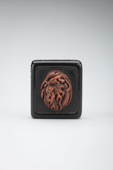 Netsuke:  dragon with wave and spray