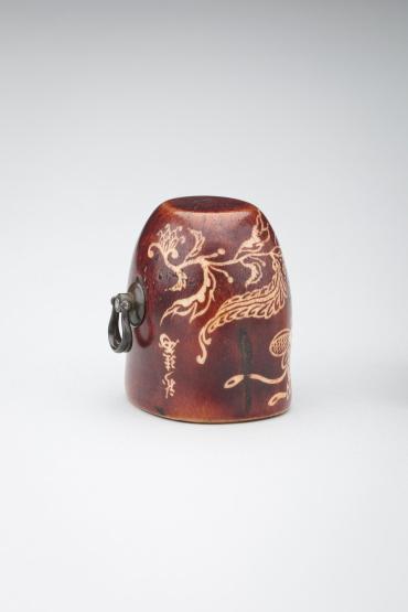 Netsuke:  flowering plant and insect