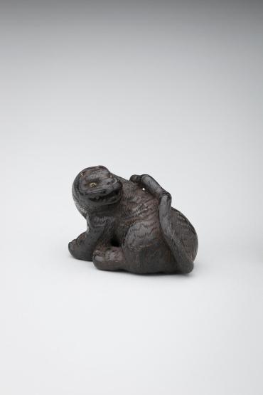 Netsuke: smiling tiger