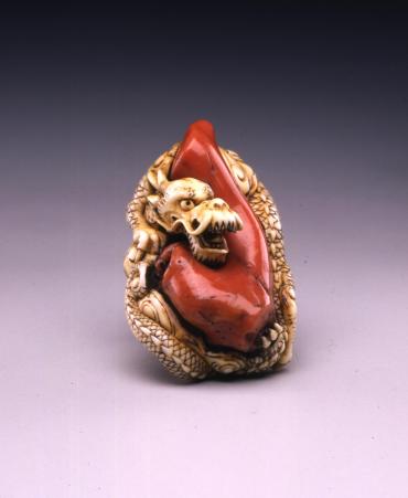 Netsuke: dragon with coral