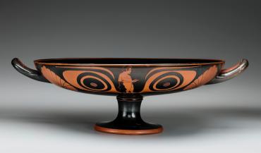 Kylix (drinking cup); Front:  a victorious athlete; Back:  a marker boy; Interior:  a centaur; Inscription:  "The boy is handsome."