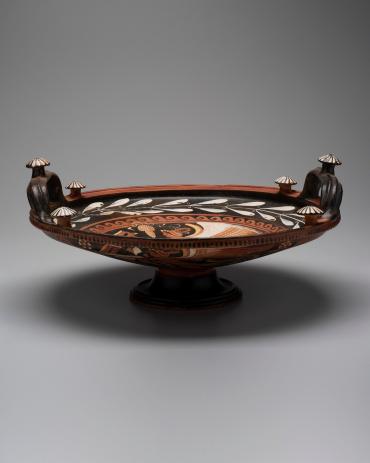 Knob-handled Dish; On the inside and outside are scenes of the god Eros.