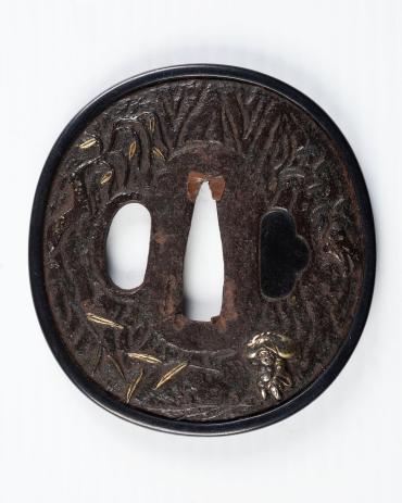 Sword Guard (Tsuba):  (front)  Hotei, God of Good Luck, with a Bag; (back) Ebisu (?), God of Daily Food, in a Boat with Crane, Symbol of Longevity, Flying Above