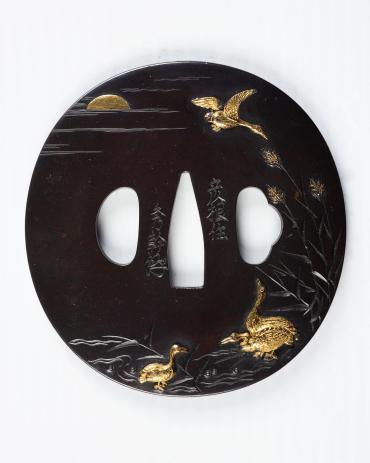 Sword Guard (Tsuba):  (front) Geese, Water, Rushes, and Rising Moon; (back) Stream with Rocks and Water Plants