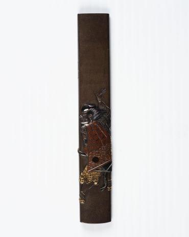 Kozuka: (front) Master Chasing a Servant; (back) signature