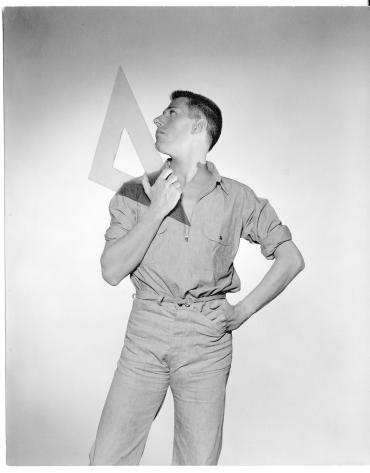 Untitled (Paul Cadmus holding a triangle) from a collection of 33 photographs of members of Lincoln Kirstein's circle