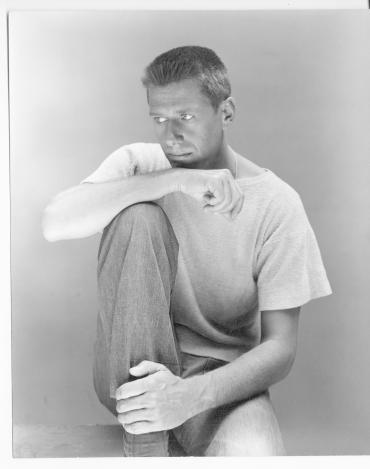 Untitled (Paul Cadmus, seated with arm resting on one raised knee), from a collection of 33 photographs of members of Lincoln Kirstein's circle