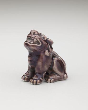 Netsuke: Seated Komainu guardian lion-dog