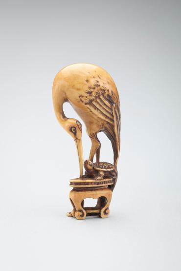 Netsuke: crane on table with tortoise