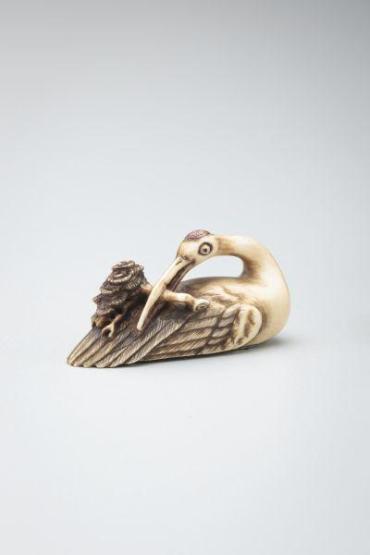 Netsuke: crane with pine branch