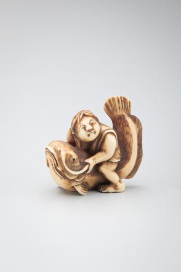 Netsuke: Kintaro riding Namazu (Wonder Boy riding the Earthquake Fish)