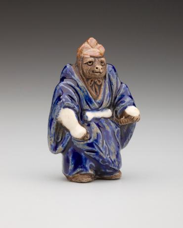 Netsuke: Tanuki in samurai dress