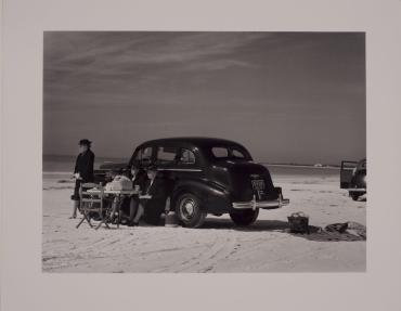 Winter Tourists Picnicking on Running Board of Car near  Trailer Park, Sarasota, Florida