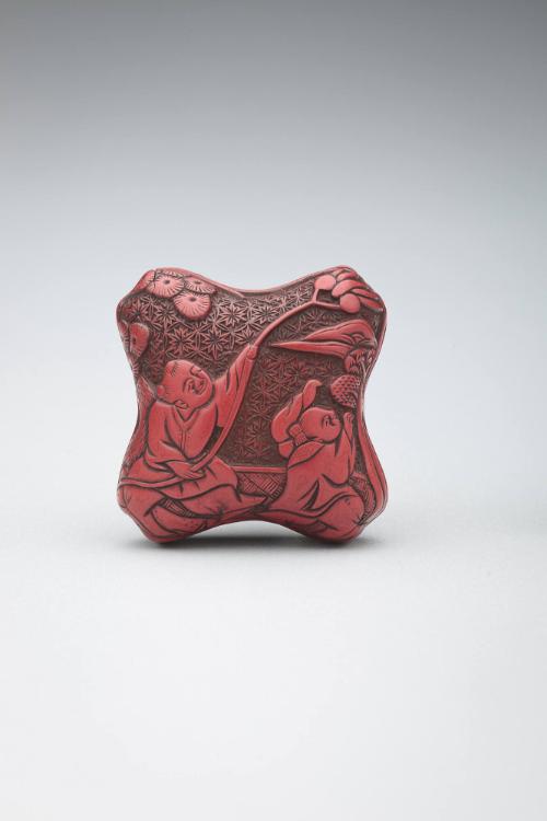 Netsuke:  Three Figures in a Landscape