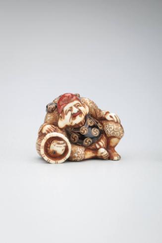 Netsuke: Ebisu, seated with a basket of fish