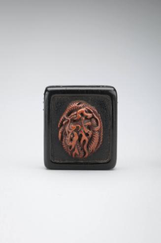 Netsuke:  dragon with wave and spray