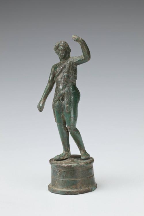 Bacchus, wearing panther skin, his left arm raised