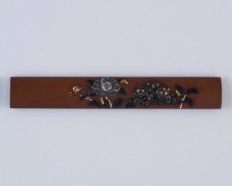 Kozuka: (front) Lion and a Peony; (back) inscription