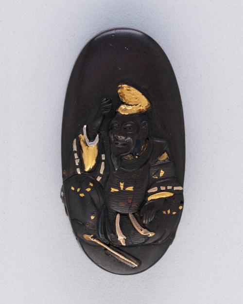 Kashira: Seated Sage with a Gold Cap