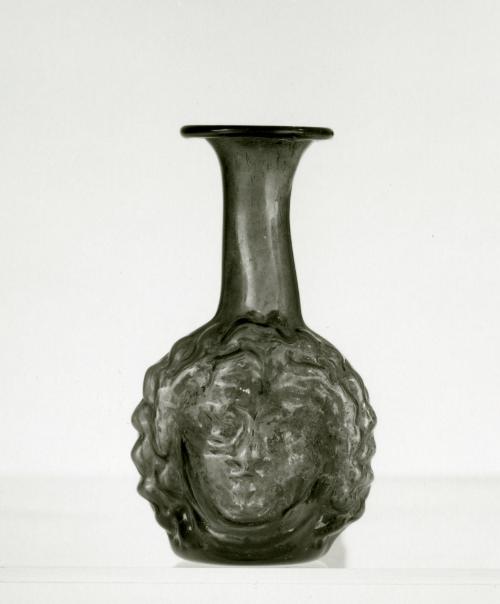 Double Head-shaped Flask: Two Similar Idealized Faces Perhaps Medusas