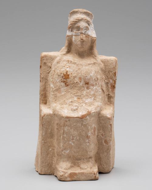 Woman seated/enthroned goddess wearing polos