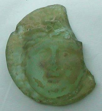 Medallion fragment with molded Medusa head