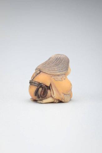 Netsuke: Okame kneeling