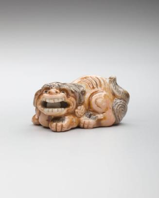 Netsuke: Reclining shishi lion