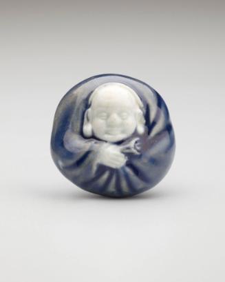 Netsuke: Manjû in shape of Hotei with treasure bag