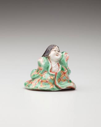 Netsuke: Okame pleasuring herself