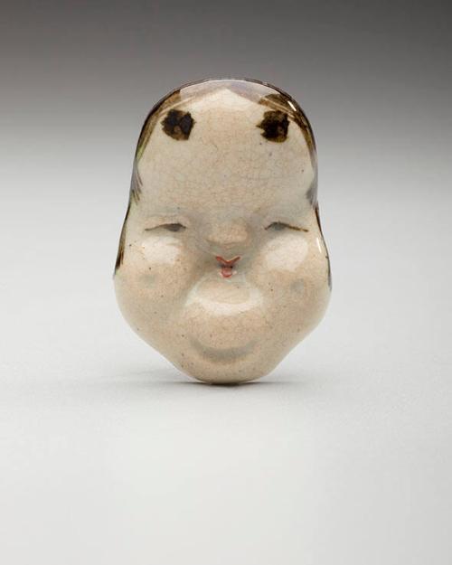 Netsuke: Mask of Okame