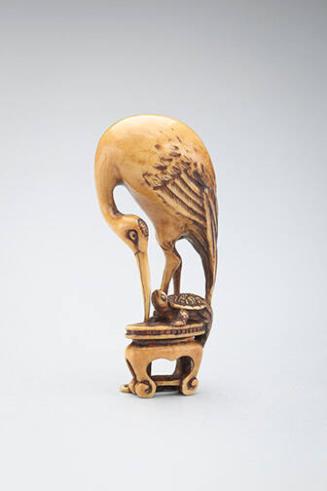 Netsuke: crane on table with tortoise