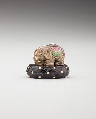 Netsuke: Elephant on a decorative pedestal